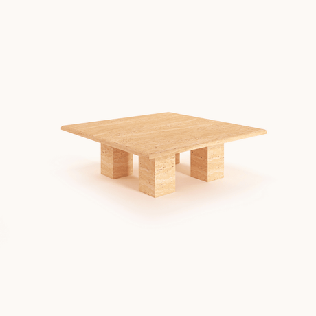 Pebble Path Travertine Coffee Table by Travertable features a fluid, freeform design with a unique stone finish against a plain white background.