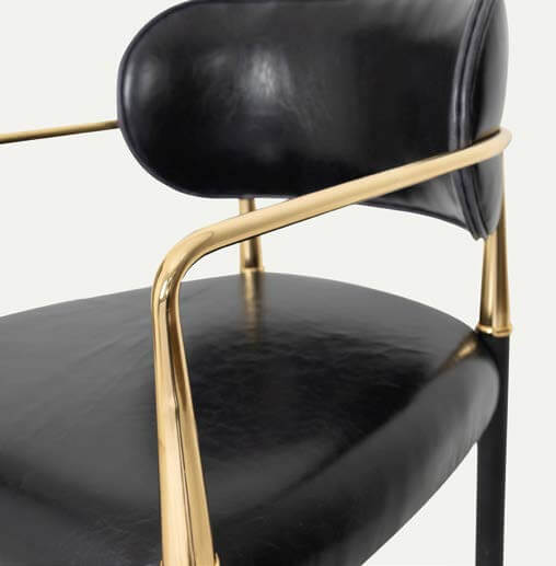 Lux Royale Bar Stool Indulge in the epitome of luxury and elegance with the Lux Royale Bar Stool. This sophisticated stool is crafted with a striking combination of black leather and gleaming gold accents, designed to bring a touch of opulence to any bar