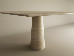 The TRAVERTABLE Square Travertine Dining Table features a natural travertine top and a conical pedestal base, customizable to your style, and is shown against a neutral background.