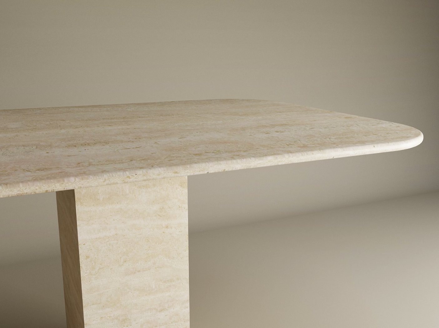 The TRAVERTABLE Rectangular Travertine Dining Table features a natural travertine stone top with rounded edges and a sturdy rectangular pedestal base, offering minimalist elegance. Customizable options are available.