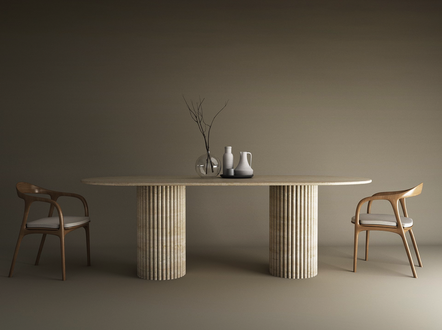 The TRAVERTABLE Oval Travertine Dining Table with Vertical Groove Base features a natural stone top, organic base, and is paired with two wooden chairs with white cushions. Minimalist decor includes a glass vase and ceramic pitchers against a beige background.