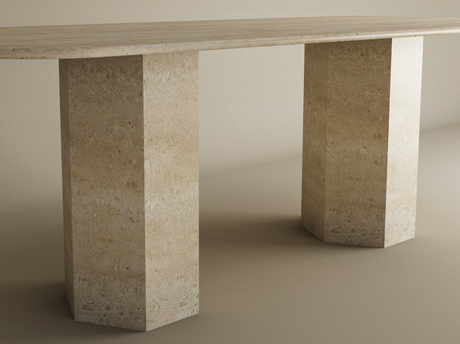 The TRAVERTABLE Rectangular Travertine Dining Table features a natural stone tabletop and two hexagonal pedestal bases, blending minimalist design with organic travertine—perfect for modern dining spaces. Customizable to fit your style.