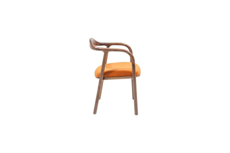 The Travertable Contemporary Curve Armchair boasts a striking modern design with a sleek wooden frame, vibrant orange fabric seat, and elegantly curved backrest. The integrated armrests enhance its contemporary flair, set against a plain white background.